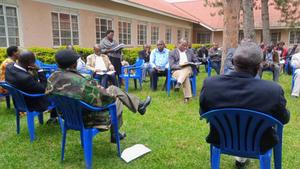 Members of the Kisoro COVID-19 Taskforce holding a meeting Wednesday April 22. (PHOTO: Moses Agaba)