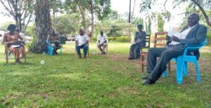 RDC Oya (R) chairing one of the Arua district COVID-19 task force meetings before banning the media