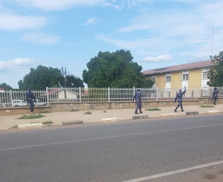 Security officials patroling round the hospital shortly after the arrival of the COVID-19 patients on Friday