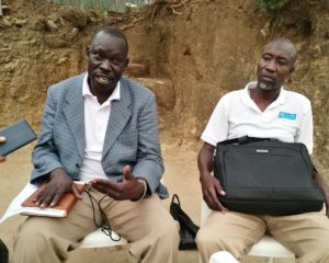Bitter Atima spits fire as Kato (R) looks on during the press briefing
