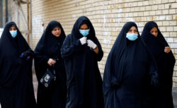 Shi'ite pilgrims make their way to Kadhimiya to mark the death of Imam Moussa al-Kadhim during a curfew imposed to prevent the spread of coronavirus disease (COVID-19), in Baghdad