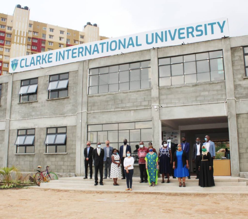 Bishop-Zac-Niringiye-Dr.-Ian-Clarke-Dr.-Rose-Nanyonga-in-a-group-photo-at-the-new-CIU-Campus