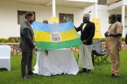 The Ubimo (2R) hands over the Ker Alur flag to the MTN CEO