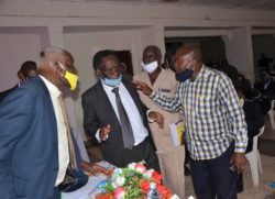 Tumuhimbise Zadock (R) exchnage bitter wprds with some of the leaders