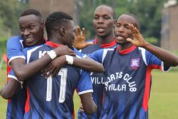 emmanuel-kalyoya-and-sc-villa-players_3capiyntggbe141yhak55046j