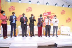 Minister of Trade Hon Amelia Kyambadde (3rd right) ringing the bell to flag off the Raising the Bar initiative. She is joined by Alvin Mbugua (centre) the MD UBL; Eng David Luyimbazi, the Deputy ED KCCA (3rd left); Tom Kakaire, Head of Strategic Plan