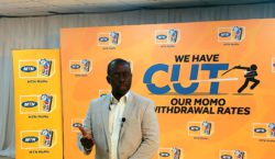 Stephen Mutana while addressing the press at the MoMo withdrawal price cut press conference