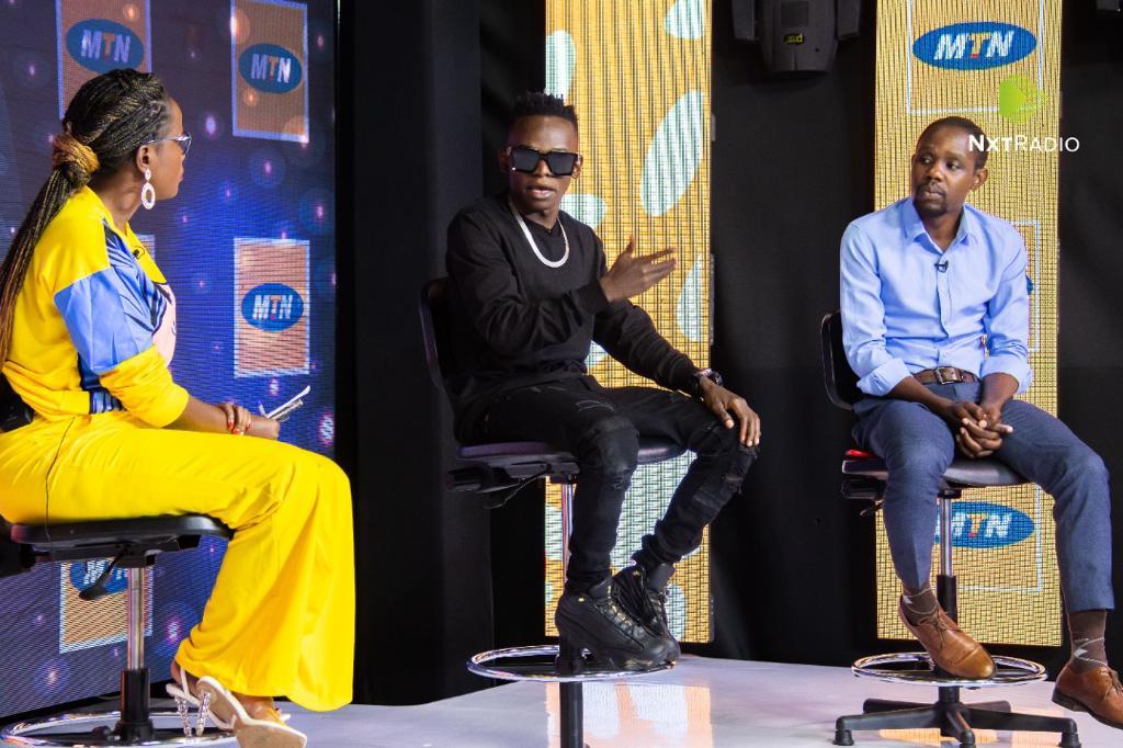 John Blaq (C) makes his remarks at the launch of the MTN Caller Tunez Awards