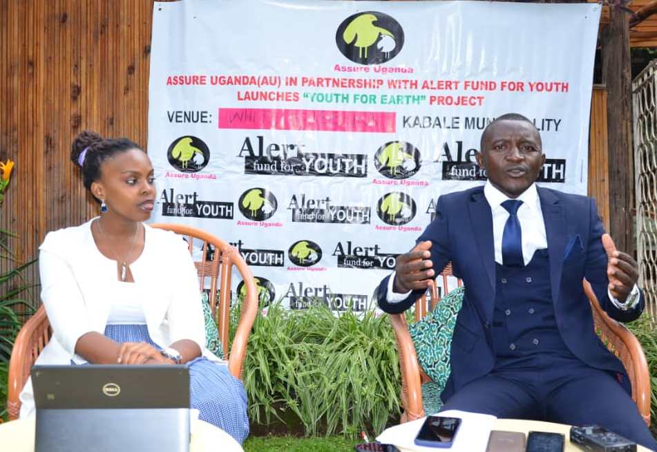 Deo Oburye the President of Assure Uganda, with Victoria Abigaba Executive Director of Assure Uganda addressing the press at the launch of the program in Kigezi