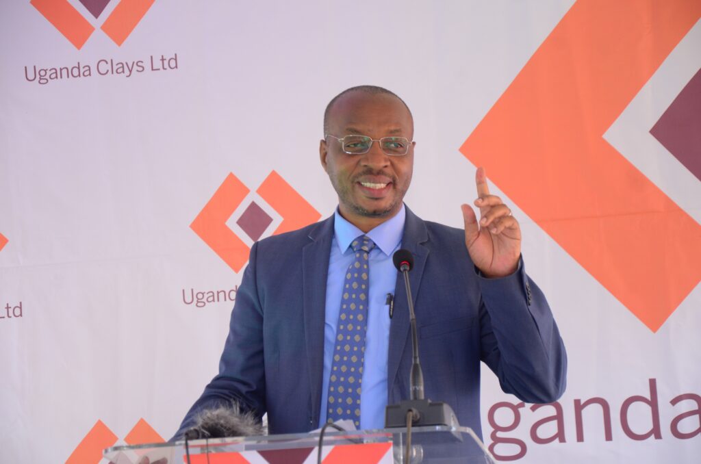Ruben Tumwebaze the Managing Director of Uganda Clays Limited speaking on Wednesday during the release of the half year performance report