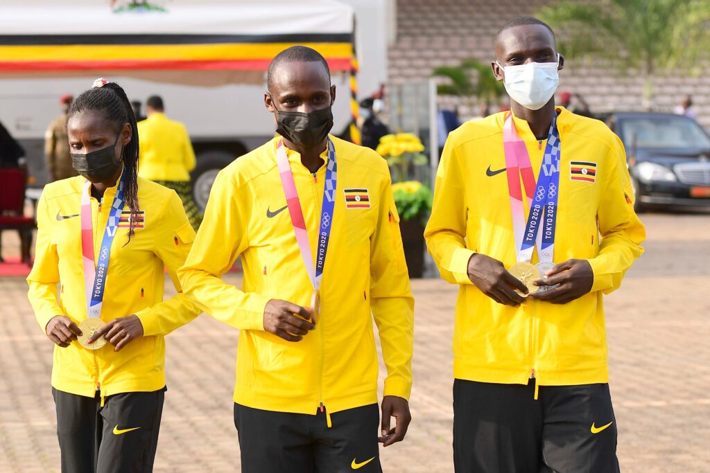 Ugandan Olympic medialists share a light moment at Kololo