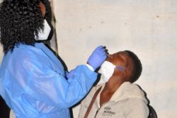 A-health-worker-testing-for-COVID-19.-Courtesy-photo