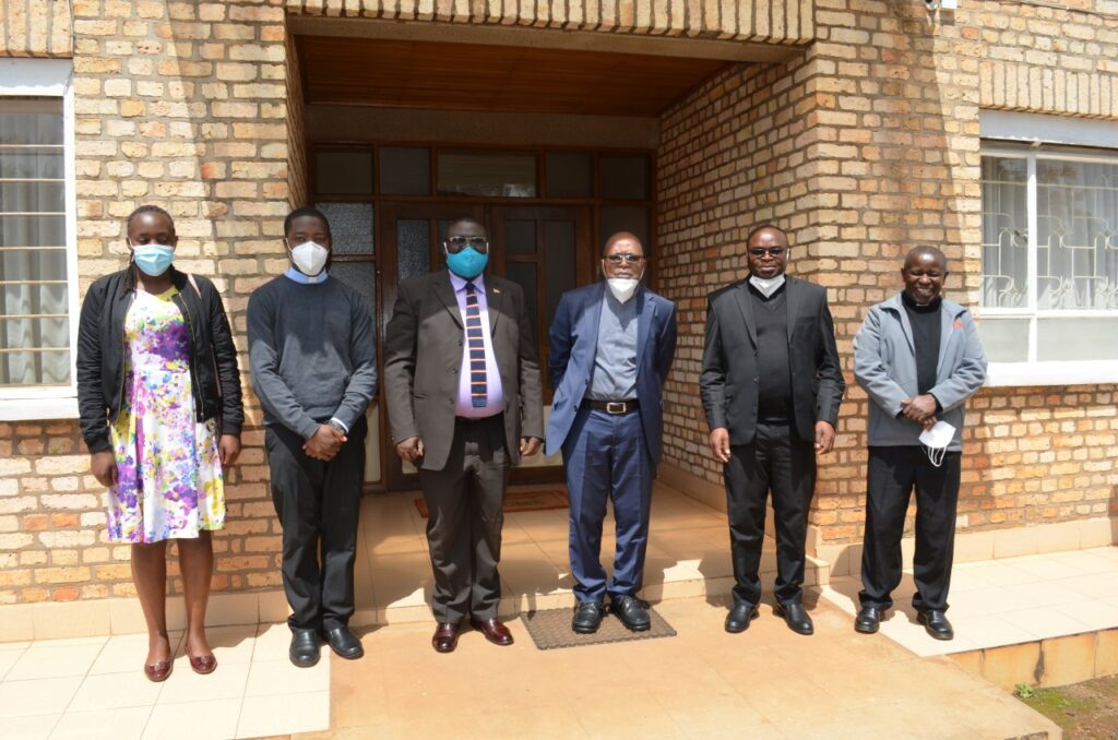 Bishop Callistus Rubaramira of Kabale Diocese (4th ) with RDC Nyakahuma