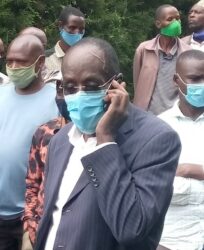 Capt. Charles Kanyankore on phone after being ganged up by locals t