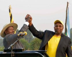 Rugunda-pictured-with-Museveni-at-a-past-event