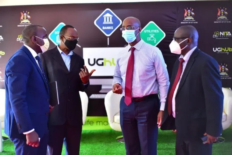 Collin Mugasha (Director E-Government Services), Hon. James Kyewalabye Kabajo (Ag. Board Chair – NITA-U), Dr. Hatwib Mugasa (ED NITA-U), and Julius Torach (Commissioner IT, Ministry of ICT & NG)