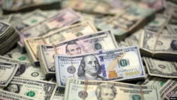 U.S-dollar-banknotes-are-seen-in-this-photo-illustration