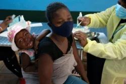 Scientists in South Africa have expressed concern about a new variant of the coronavirus with a high number of mutations. Some worry it might also be better able to evade the immune system [File: Denis Farrell/AP Photo]
