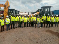 The project steerin committee in a group photo with some of the equipment to be used in the project