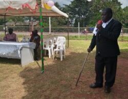 Geoffrey-Alii-addressing-parents-in-Gulu-recently-300x233-1