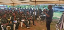 Bashaasha lecturing to the attentive youth leaders on Sunday