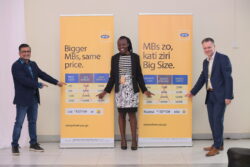 The MTN CEO, Wim Vanhelleputte (R) and Sen Somdev MTN CFO (L) and a staff, in a group photo after announcement on Thursday