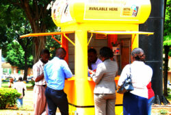 Customers at one of the MTN Mobile Money Outlet