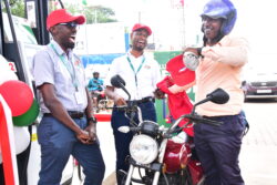 A Rubis staff interacting with a motorist on Thursday after refilling