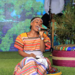 Sandra, performing her debut single, Kitandika Nawe