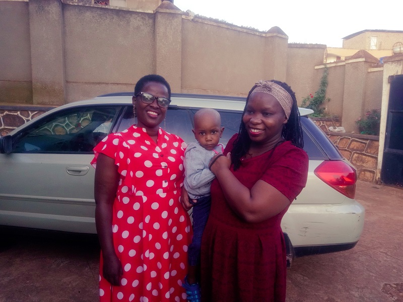 Judith-Sheena-Komuhangi-Kyamutetera-Left-country-representative-MagnusMedi-Uganda-with-2-year-old-Pius-and-his-mother-Wataka-Rose.
