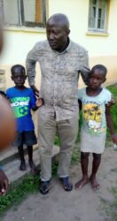 Minister Gume with Late Abiriga's young children