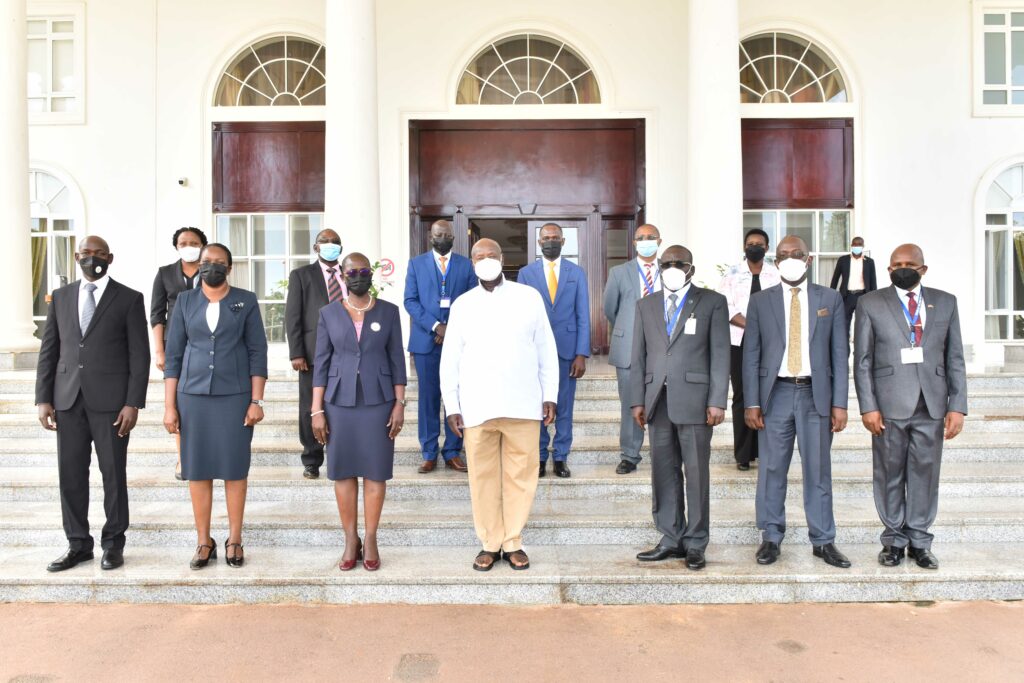 President Yoweri Museveni in a group photo with the Director of Public Prosecutions Jane Frances Abodo and her team after a meeting at the State House Entebbe on 26th May 2022. Photo by PPU