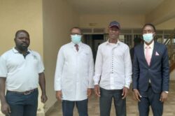 Tamale Mirundi in pause with the Mbarara RRH Boss, Barigye, Hospital PRO and others