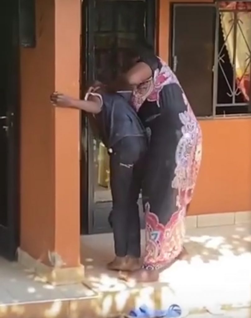 The Video grab of the Woman torturing her son
