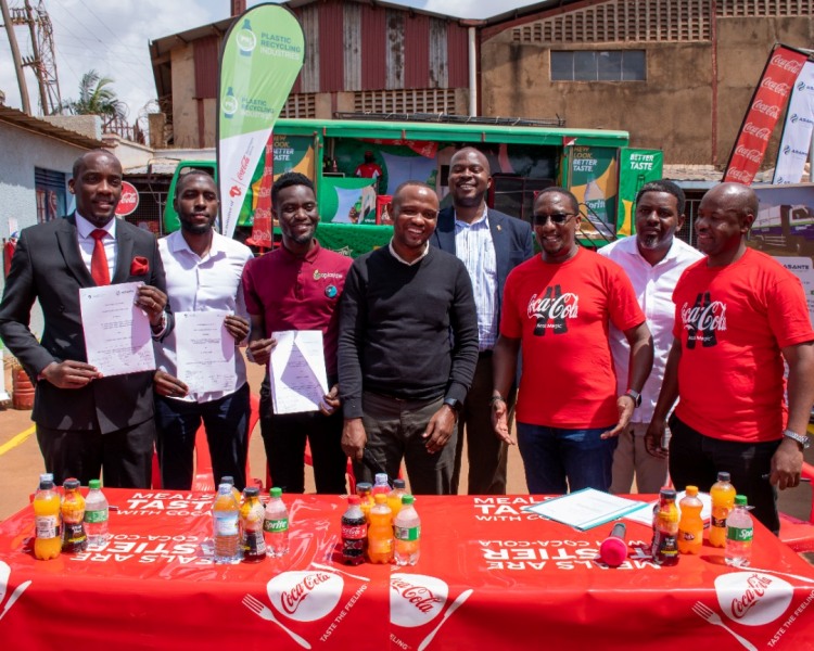 All partners pose together for a picture after the MOU signing today at Plastic Recycling Industries. Partners include_ KCCA, Asante waste management, Yo-waste, Ecoplastile and PRI representatives.