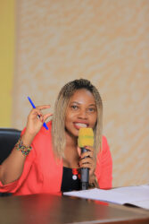 Damali Ssali Chief Programs and Projects officer PSFU giving a keynote speech at the meet and greet function held at Hotel Africana.