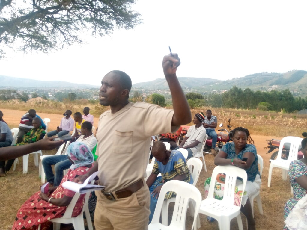 Tadeo Muhwezi raising his issues during the meeting