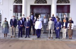The President (white shirt) in a group photo with the German delegation at State House Entebbe on Tuesday