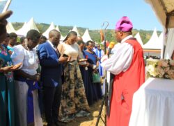 Bishop Akanjuna blesses MP Ndyomugyenyi at the thanks giving