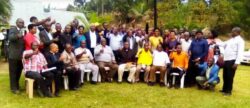 District leaders meeting pose for group photo with NRM communications director Emmanuel Dombo
