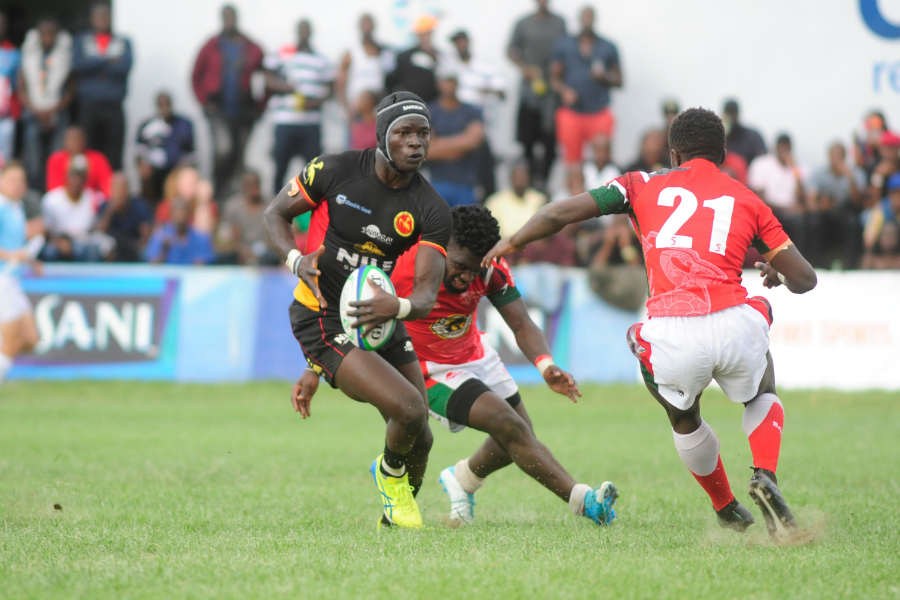 philip-wokorach-sidesteps-martin-owilah-kenya-simbas-vs-uganda (1)