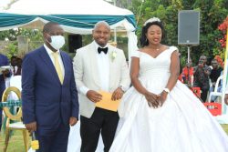 David Bahati the State Minsiter of industry with the couple