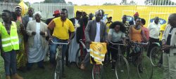 MTN's Phllip Odoi and Mildred with the Ker Alur officials kick starting the bicycles races