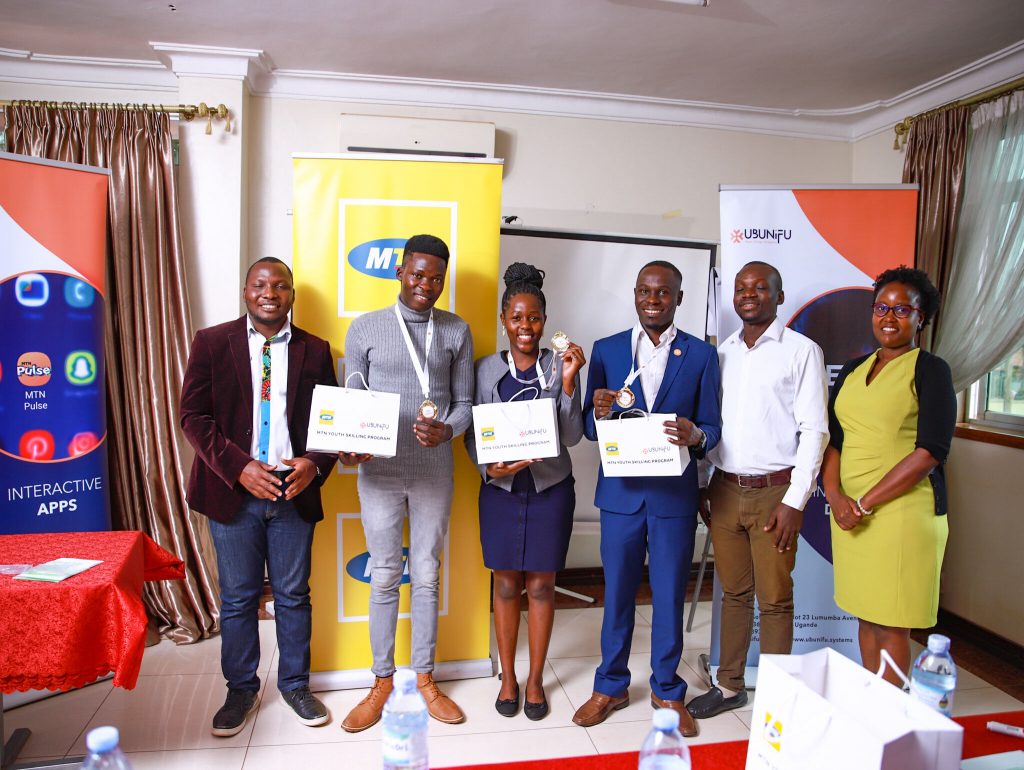 Some of the youth who participated in the program alongside MTN staff (Extreme Left and Right)- File photo