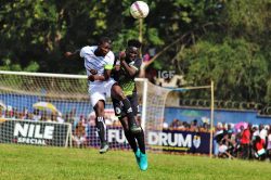 Acholi Province player (in black jersey) in action against a Buganda Province player. COURTESY PHOTO