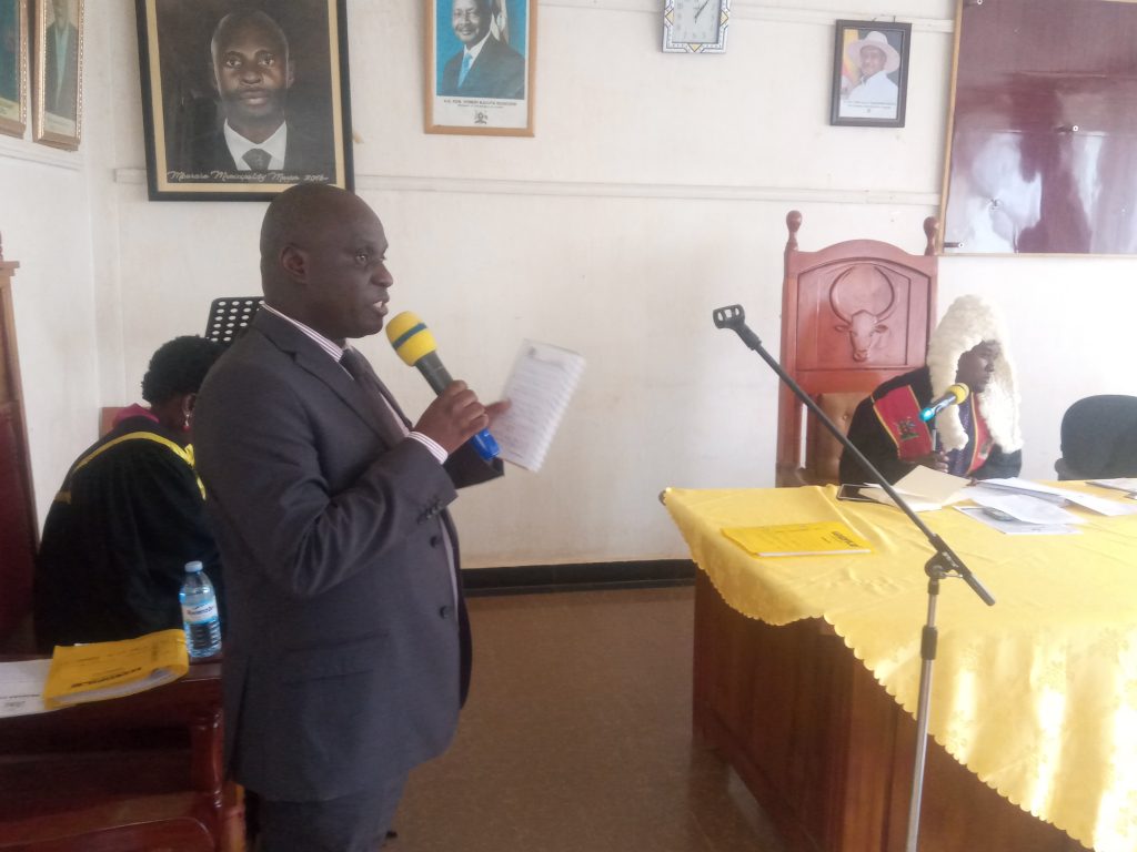 Assey Abireebe Mb'ra City Town Clerk speaking
