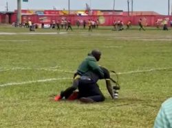 Johnson Were (on the floor) was physically assaulted by Gabriel Aredo on Sunday. Courtesy Photo