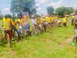 MTN-Bunyoro kingdom bicycle race participants assemble at the start line at Kiryandongo stadium