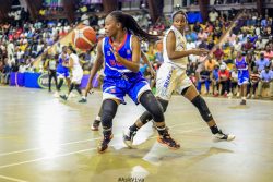 Action between UCU Lady Canons (blue) and JKL Lady Dolphins on Friday evening.