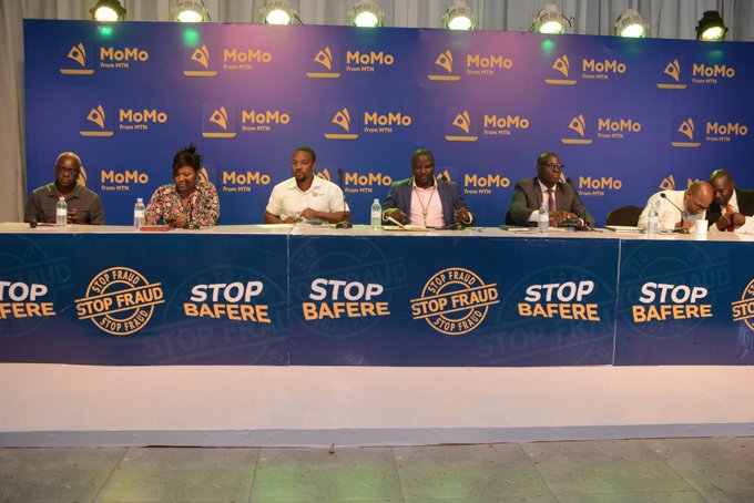 From L-R Robert Kabushega (Moderator), Patricia Amito Uganda Bankers' Association, MTN MoMo's head audit and forensics Stephen Wakhula, MTN MoMo MD Richard Yego, FIA's Kenneth Natukunda discussing